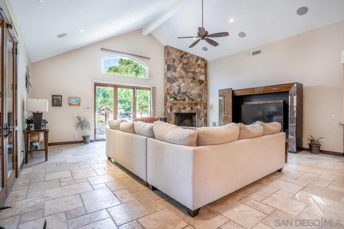 16072 Cross Fox Court Poway, CA 92064 - Photo 22 of 70 a living room with furniture and a fireplace