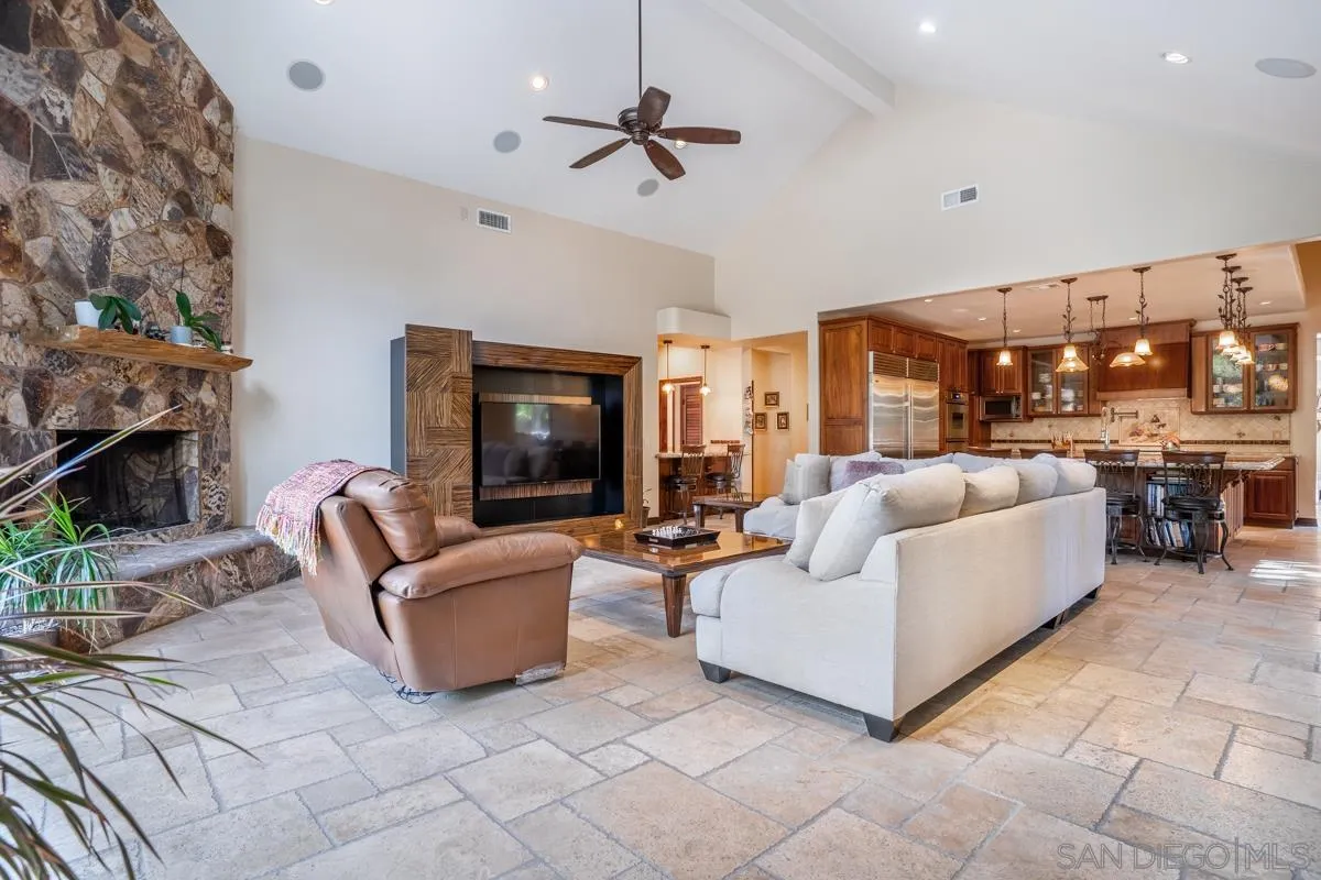 16072 Cross Fox Court Poway, CA 92064 - Photo 23 of 70 a living room with furniture and a fireplace