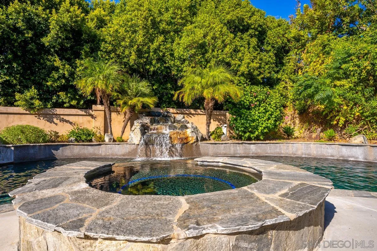 16072 Cross Fox Court Poway, CA 92064 - Photo 34 of 70 a view of a swimming pool with a yard