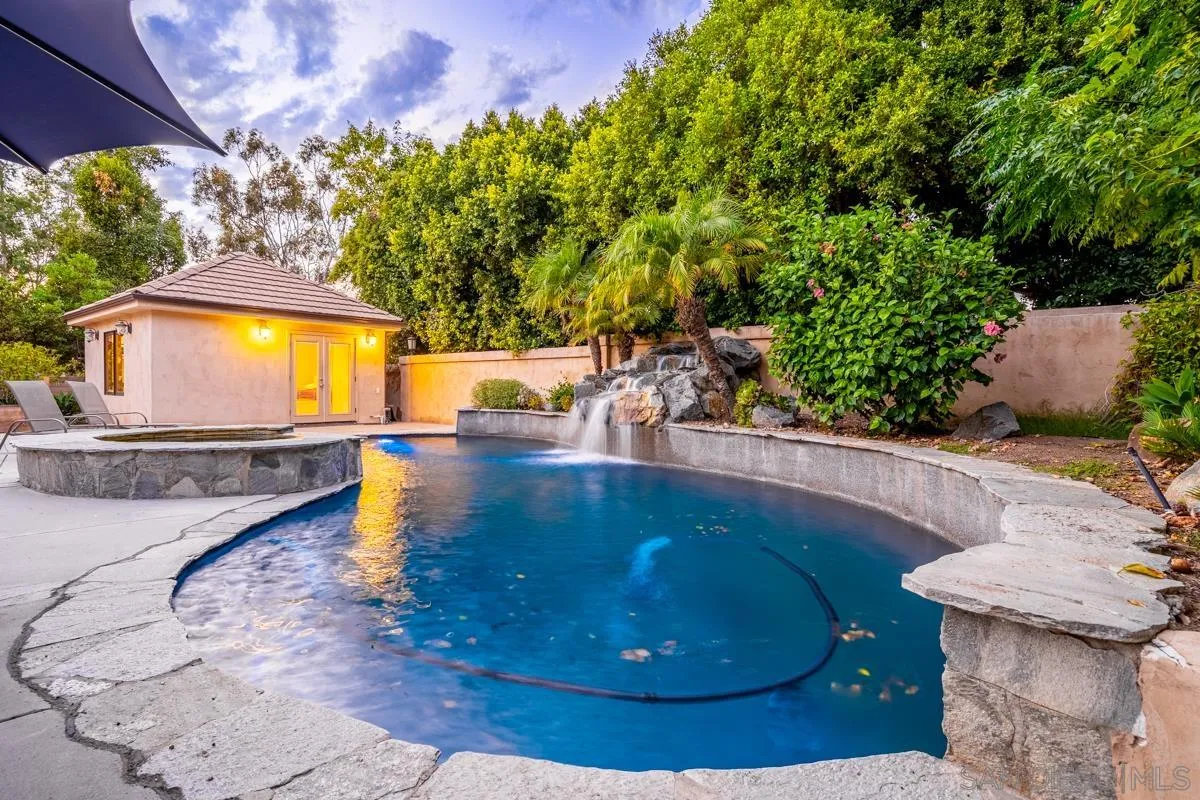 16072 Cross Fox Court Poway, CA 92064 - Photo 36 of 70 a view of a swimming pool with sitting area