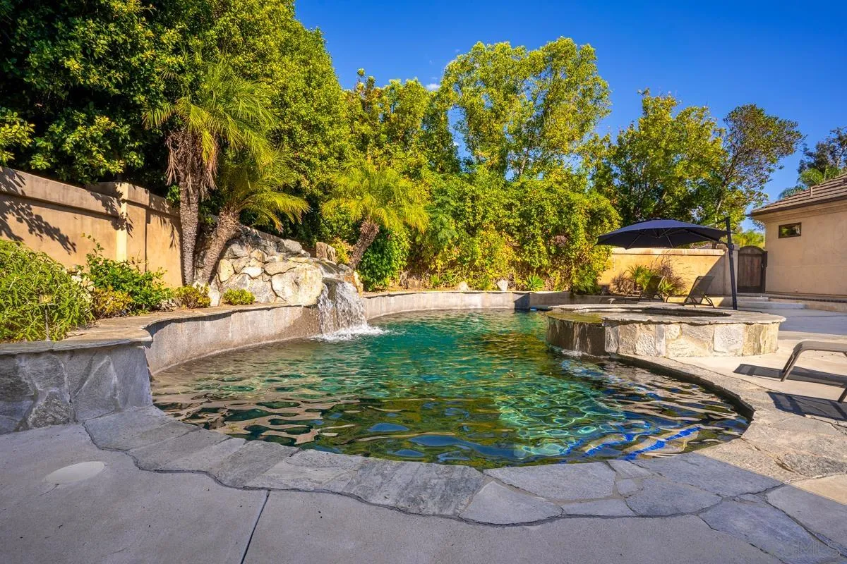 16072 Cross Fox Court Poway, CA 92064 - Photo 39 of 70 a view of a swimming pool with a patio