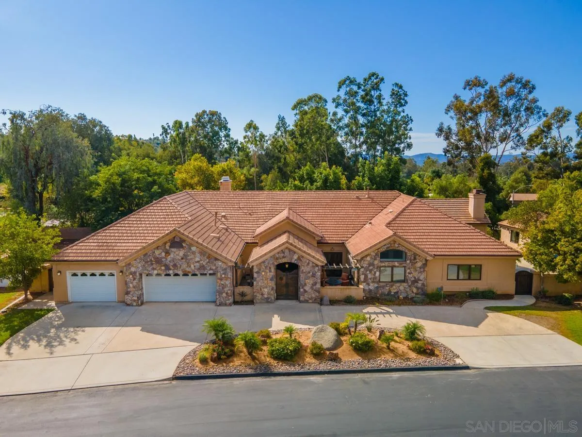 16072 Cross Fox Court Poway, CA 92064 - Photo 63 of 70 a view of house with yard swimming pool and outdoor seating