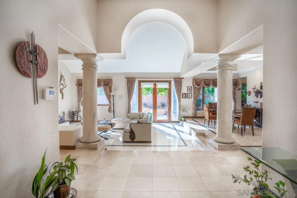 16072 Cross Fox Court Poway, CA 92064 - Photo 7 of 70 a living room with furniture and a chandelier