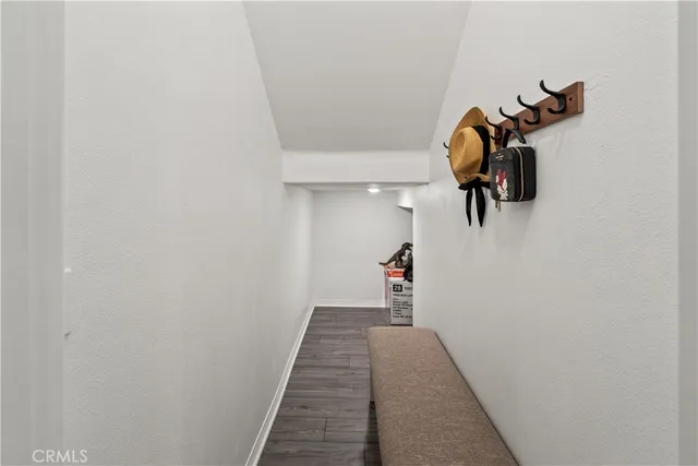 a bathroom with a sink toilet and a mirror