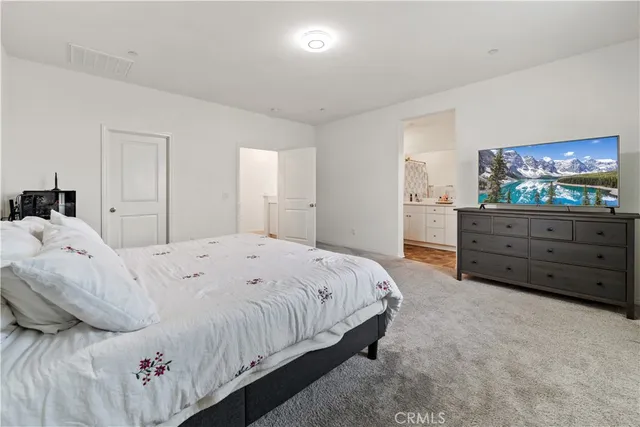 a bathroom with double sink and a mirror