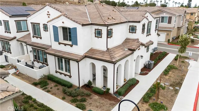 a front view of a house with balcony