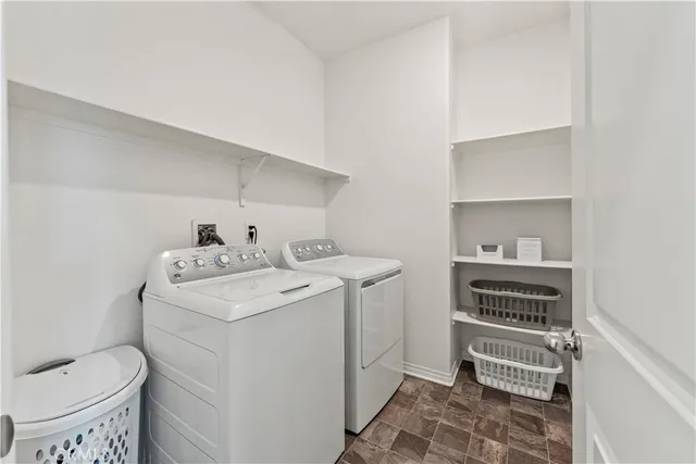 a bedroom with bed and a window