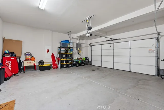 a front view of a house with lots of trees