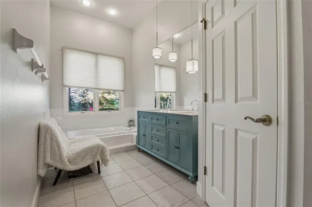 a view of a swimming pool with a lounge chair