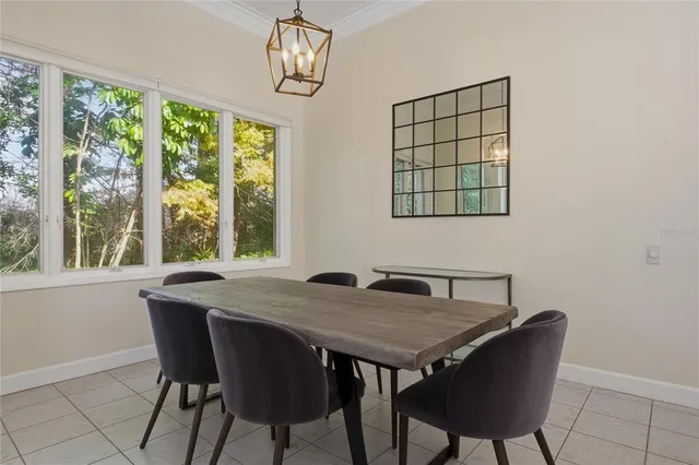 an aerial view of a house with a yard lake view and mountain view