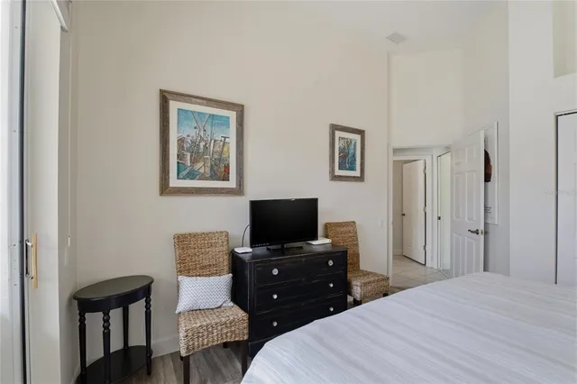 a house with palm tree in front of it