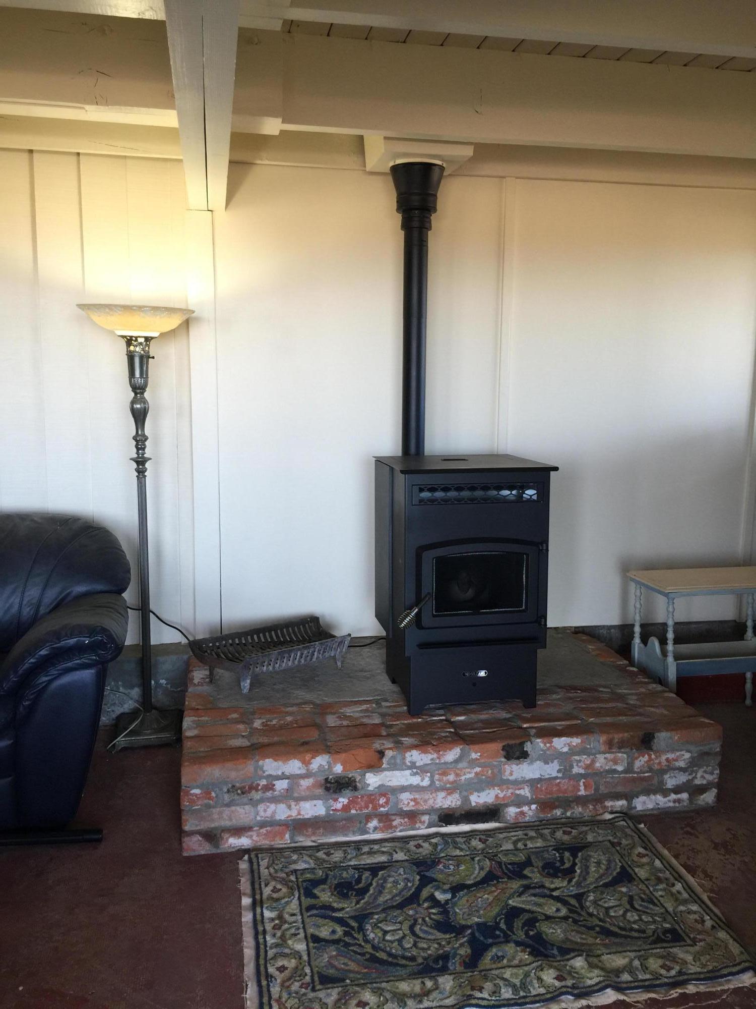 9263 Southwest Copley Road Powell Butte, OR 97753 - Photo 23 of 37 Basement Pellet Stove