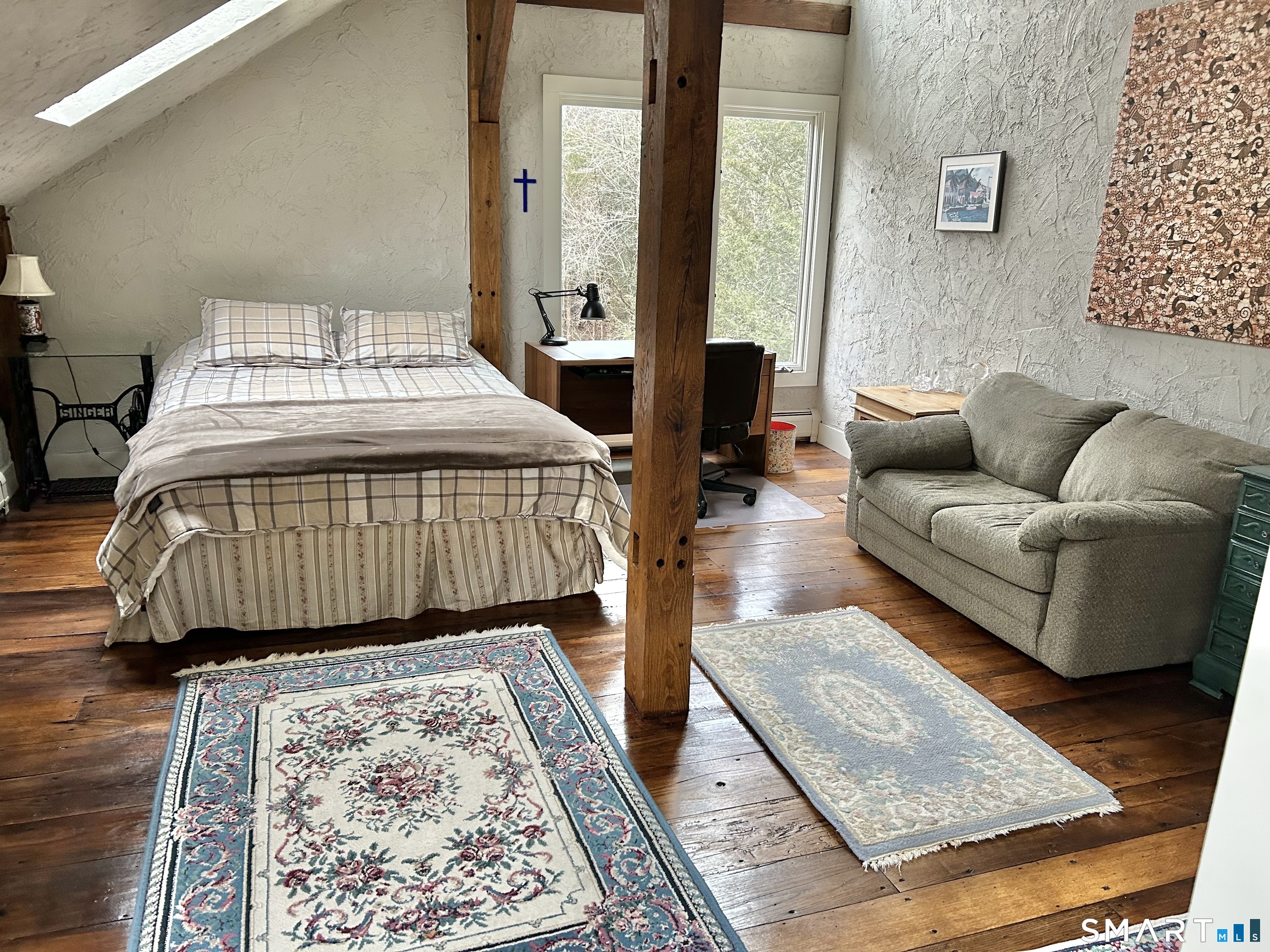 148 Flanders Road Woodbury, CT 06798 - Photo 13 of 16 a bedroom with bed and a couch