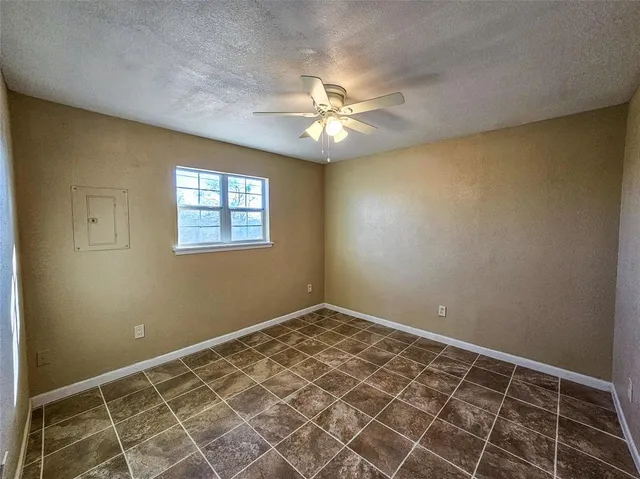 a bathroom with a sink vanity mirror and toilet