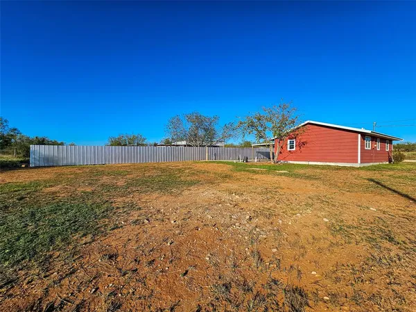 a view of an outdoor space and a yard