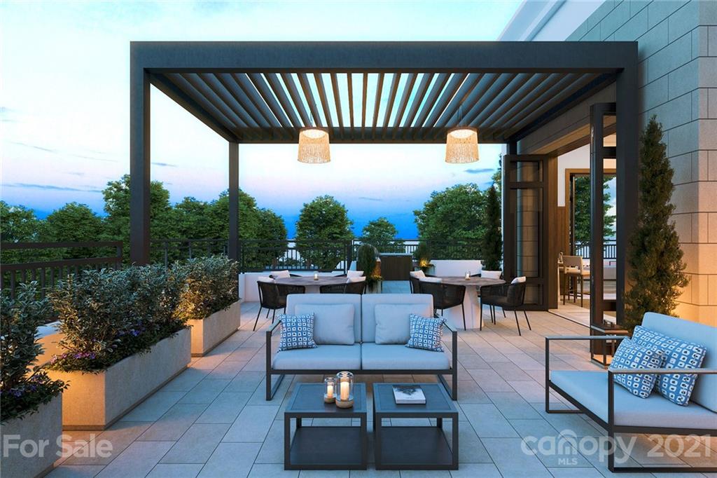130 Cherokee Road, Unit 504 Charlotte, NC 28207 - Photo 16 of 18 a outdoor living space with furniture and a potted plant