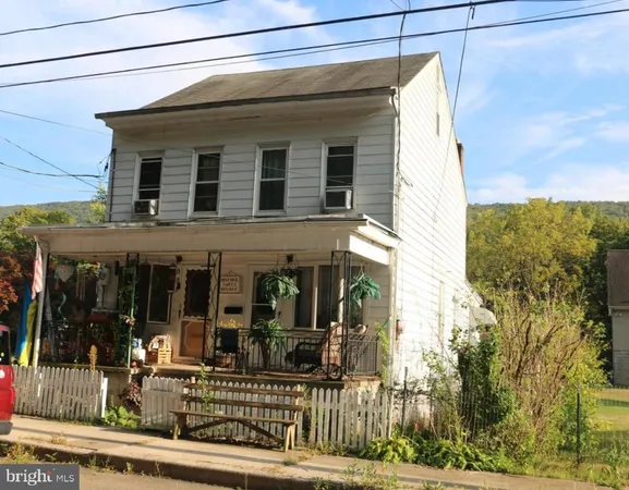 a view of a house with glass windows