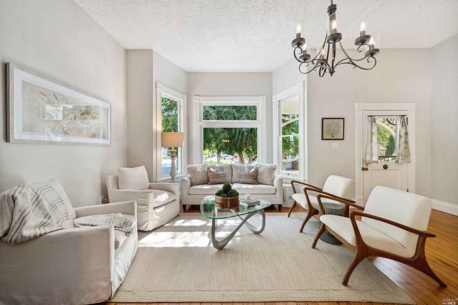 1206 Oak Street Napa, CA 94559 - Photo 1 of 24 a living room with furniture and a large window
