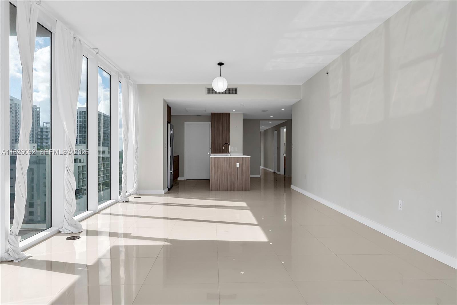 600 Northeast 27th Street, Unit 1105 Miami, FL 33137 - Photo 64 of 100 a view of a hallway with a livingroom