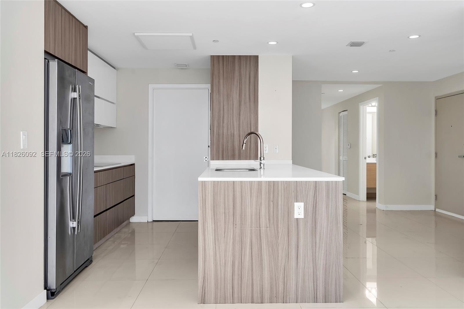 600 Northeast 27th Street, Unit 1105 Miami, FL 33137 - Photo 67 of 100 a bathroom with a sink a mirror and a shower