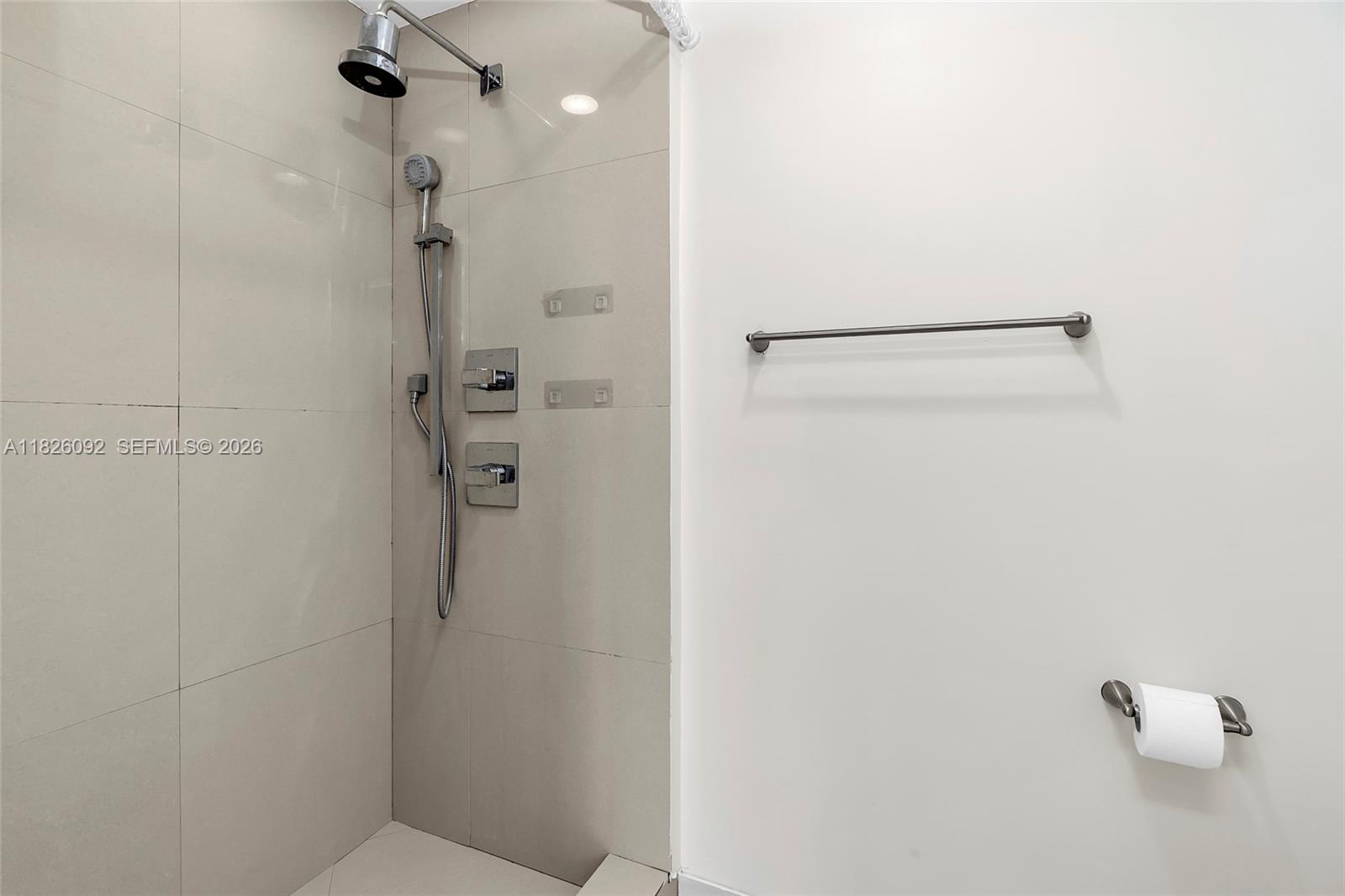 600 Northeast 27th Street, Unit 1105 Miami, FL 33137 - Photo 94 of 100 a bathroom with a shower