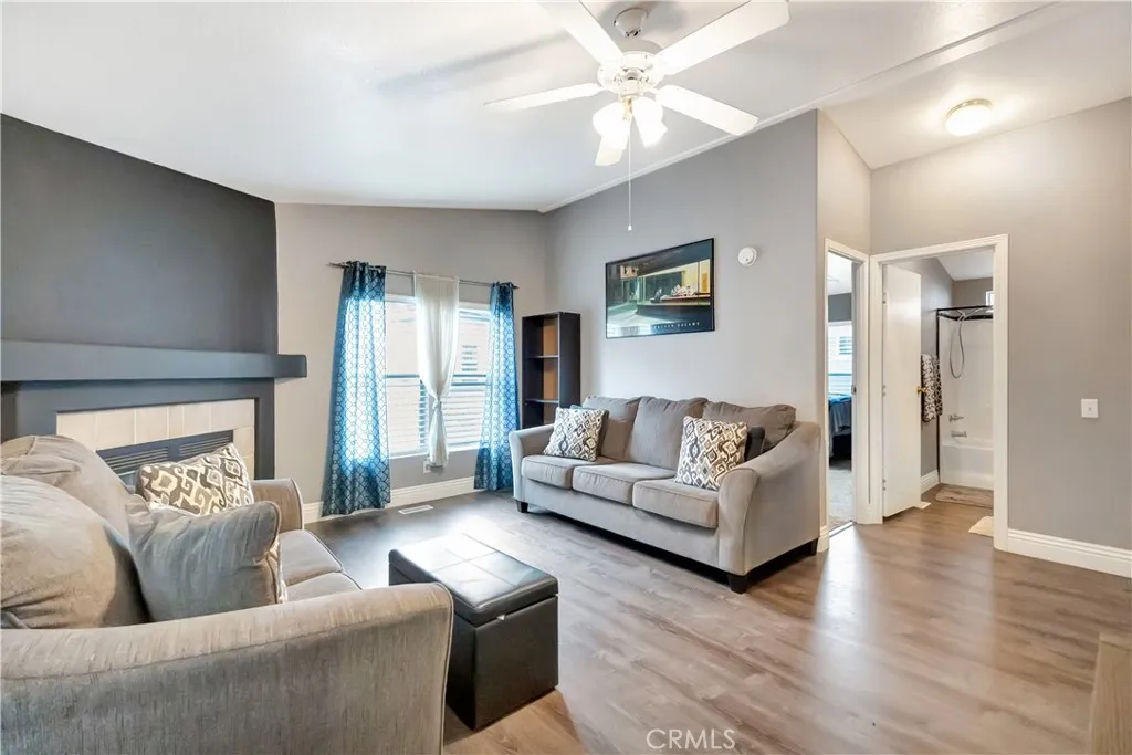 1051 Site, Unit 26 Brea, CA 92821 - Photo 20 of 46 a living room with furniture and a fireplace