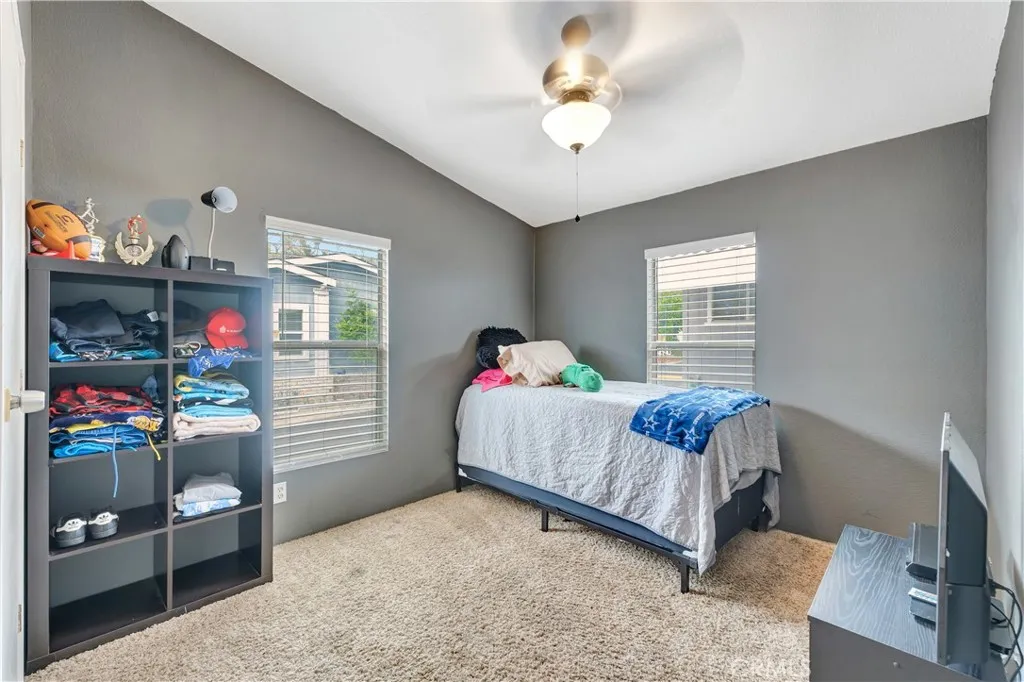 1051 Site, Unit 26 Brea, CA 92821 - Photo 24 of 46 a bedroom with a bed and a window