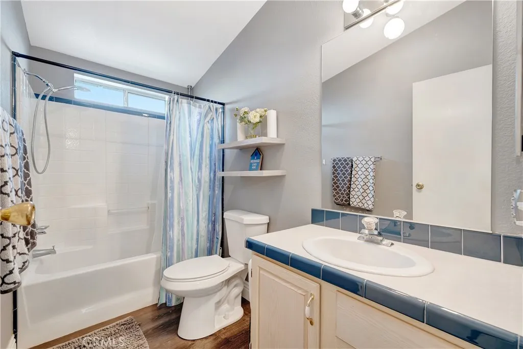 1051 Site, Unit 26 Brea, CA 92821 - Photo 27 of 46 a bathroom with a sink toilet and shower