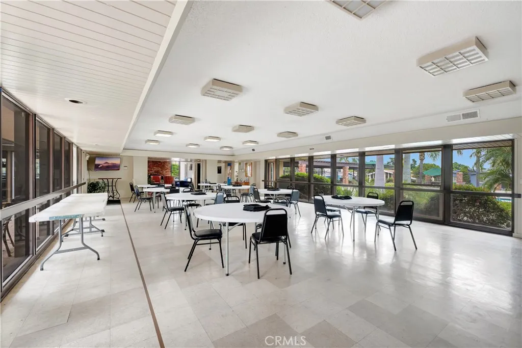 1051 Site, Unit 26 Brea, CA 92821 - Photo 34 of 46 a view of a dining hall with lots of tables and chairs