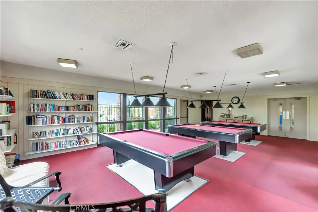 1051 Site, Unit 26 Brea, CA 92821 - Photo 40 of 46 a living room with furniture pool table and window