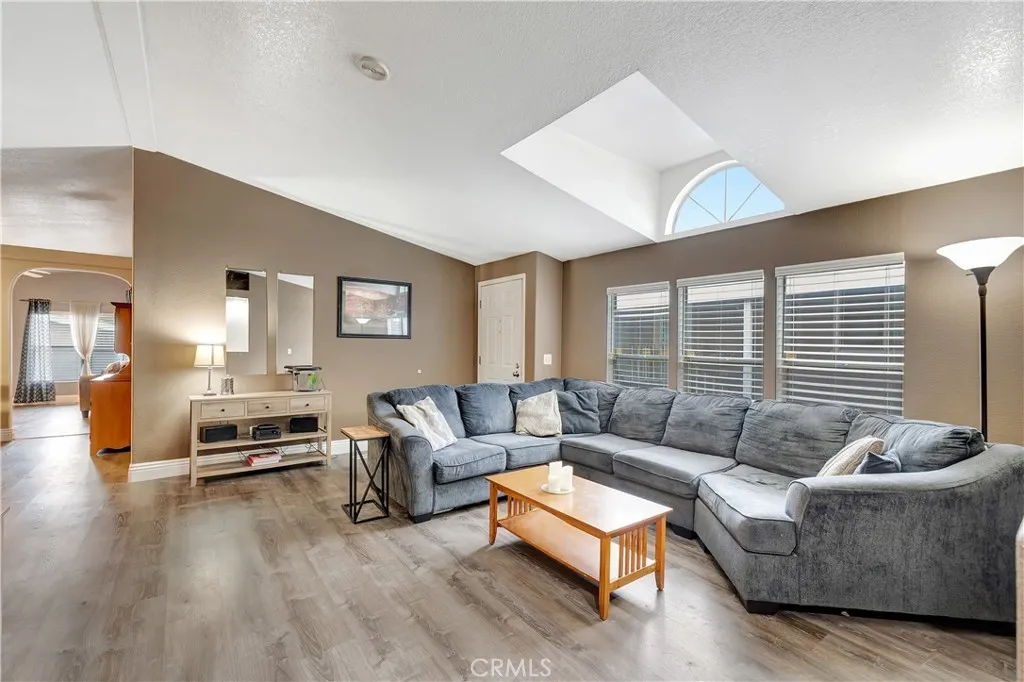 1051 Site, Unit 26 Brea, CA 92821 - Photo 8 of 46 a living room with furniture and wooden floor