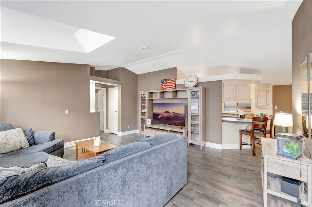 1051 Site, Unit 26 Brea, CA 92821 - Photo 9 of 46 a living room with furniture and a flat screen tv