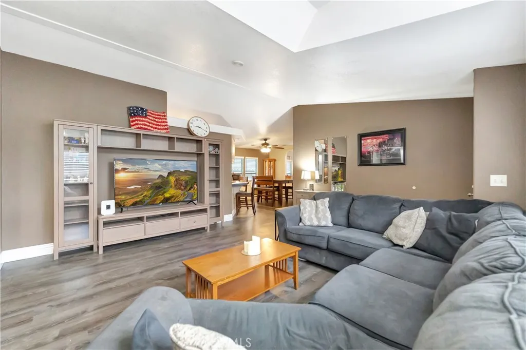 1051 Site, Unit 26 Brea, CA 92821 - Photo 10 of 46 a living room with furniture and a flat screen tv
