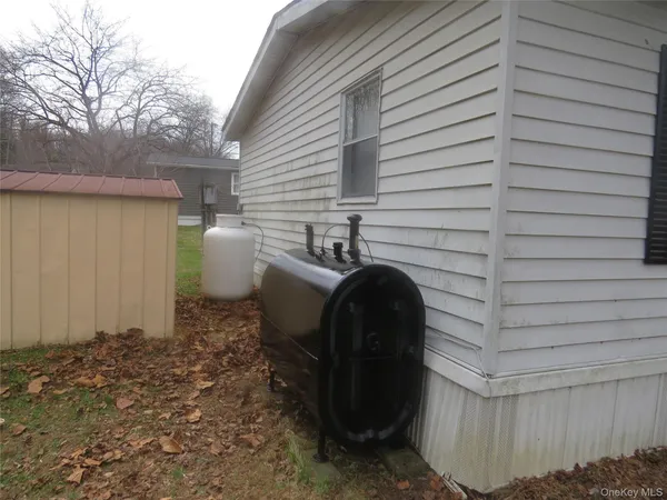 a view of a patio in backyard