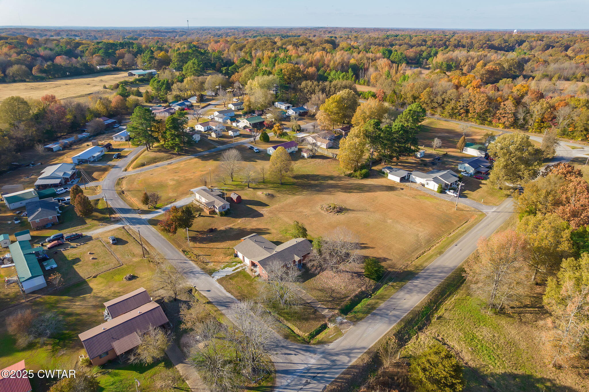 136 Mason Grove Road Humboldt, TN 38343 - Photo 15 of 36 an aerial view of residential houses with outdoor space