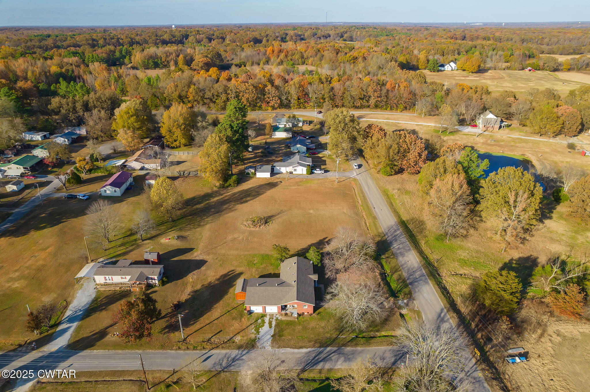 136 Mason Grove Road Humboldt, TN 38343 - Photo 16 of 36 an aerial view of residential building and parking space