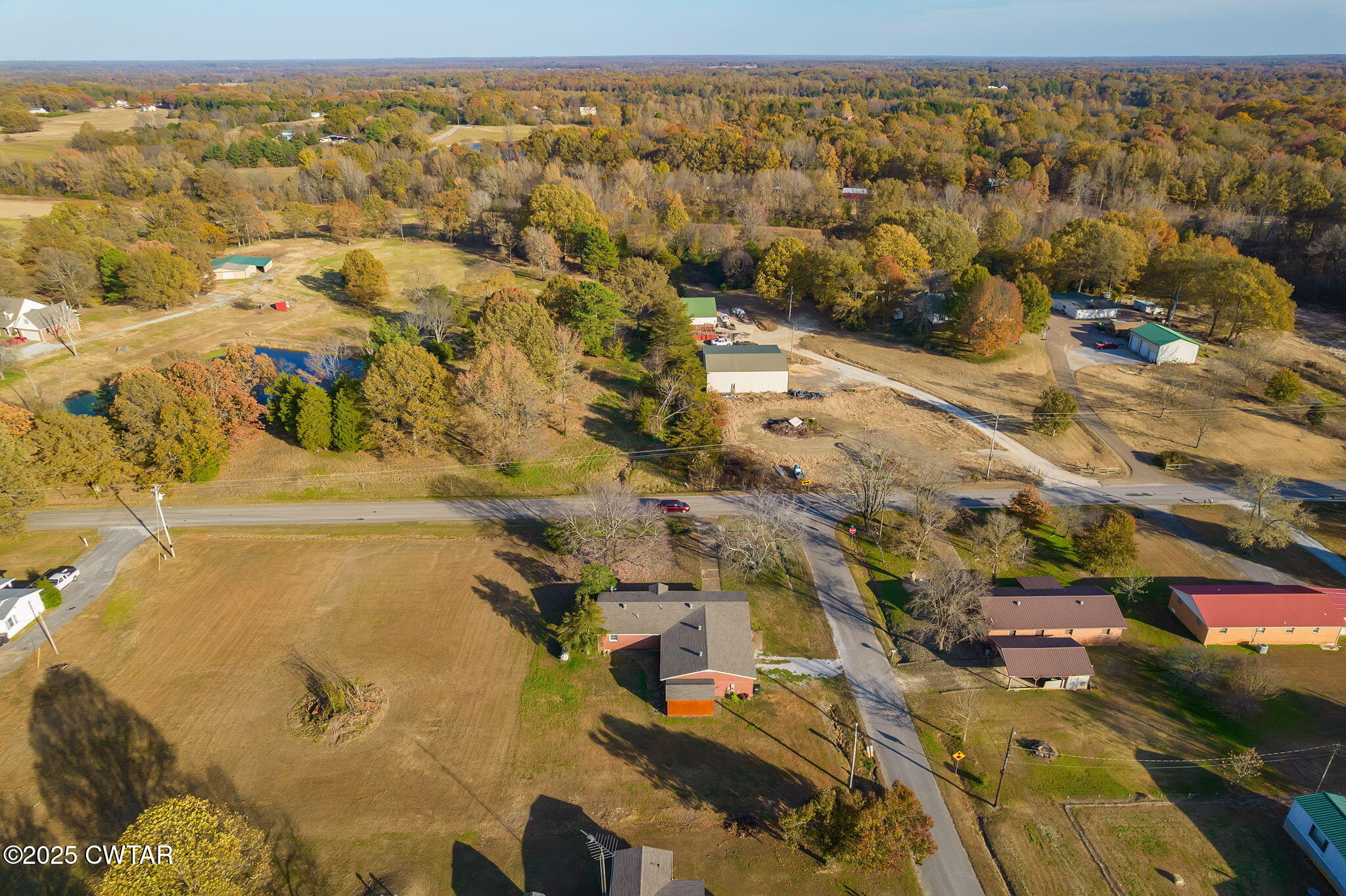 136 Mason Grove Road Humboldt, TN 38343 - Photo 17 of 36 an aerial view of residential houses with outdoor space