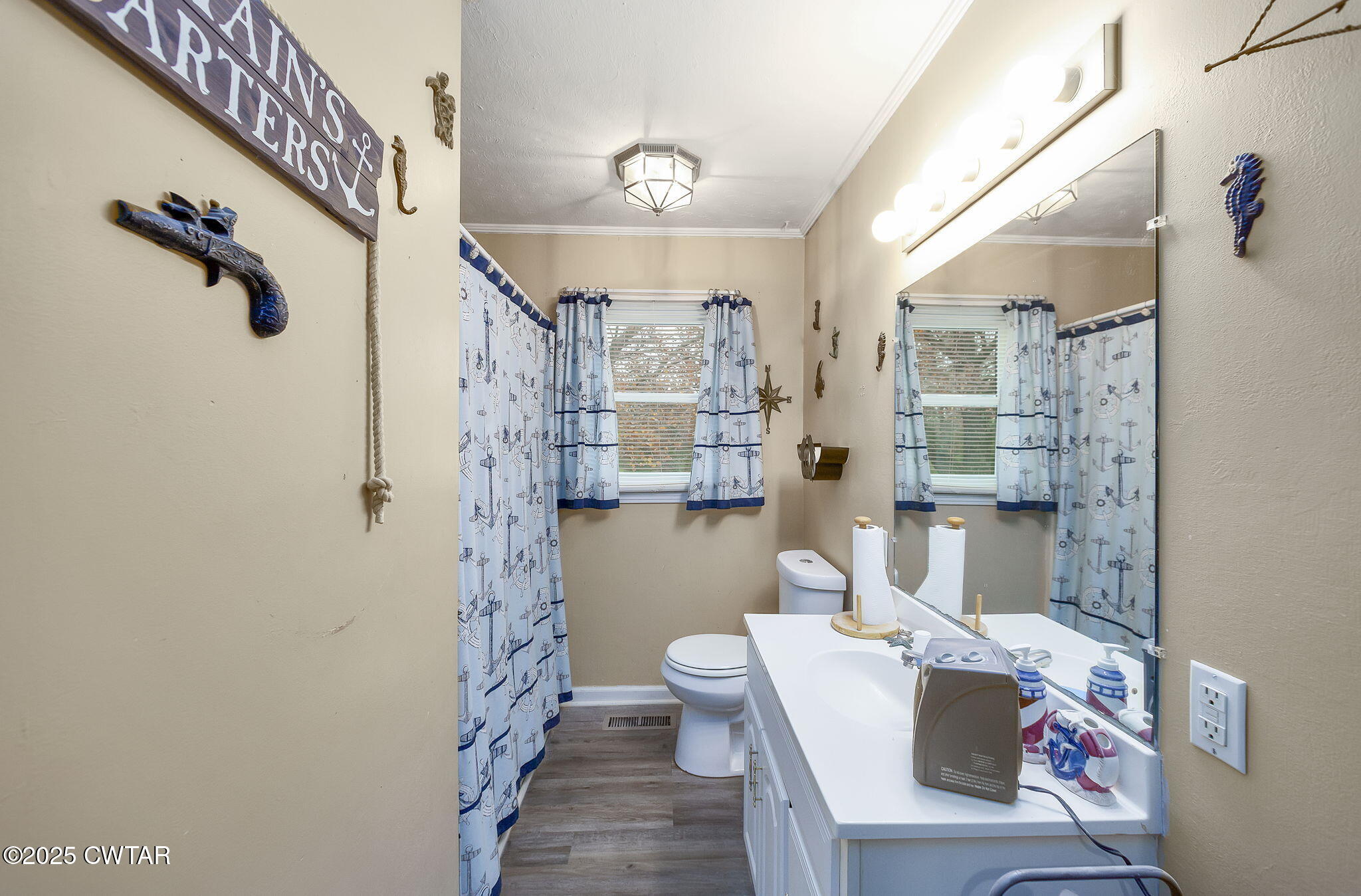 136 Mason Grove Road Humboldt, TN 38343 - Photo 27 of 36 a bathroom with a sink a toilet and shower