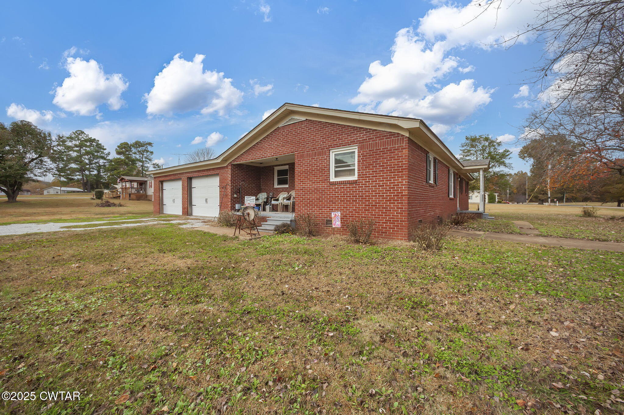 136 Mason Grove Road Humboldt, TN 38343 - Photo 4 of 36 a front view of house with garden