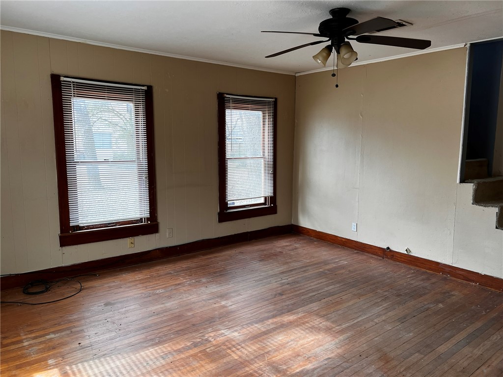 4101 College Main Street Bryan, TX 77801 - Photo 2 of 25 a view of an empty room with wooden floor and a window