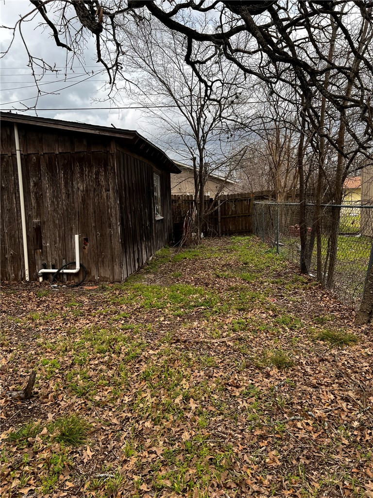 4101 College Main Street Bryan, TX 77801 - Photo 24 of 25 a backyard of a house with lots of green space