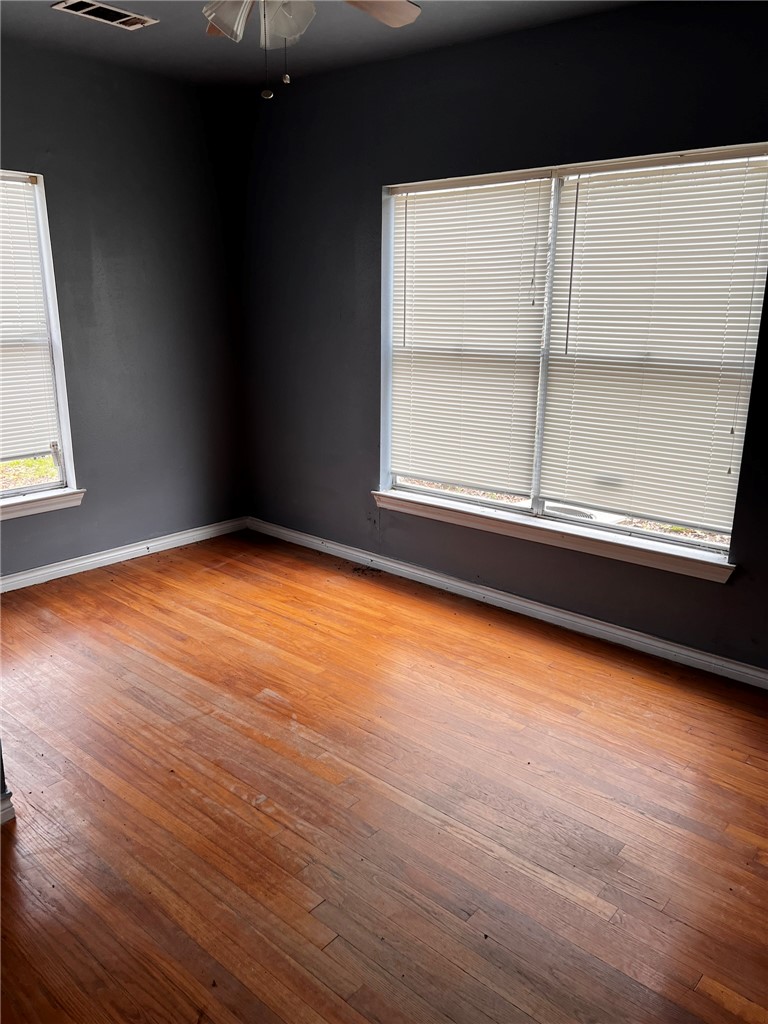 4101 College Main Street Bryan, TX 77801 - Photo 6 of 25 a view of a room with wooden floor and window
