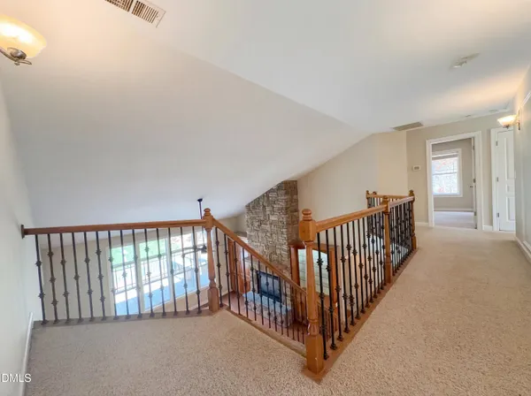 a view of hallway with stairs