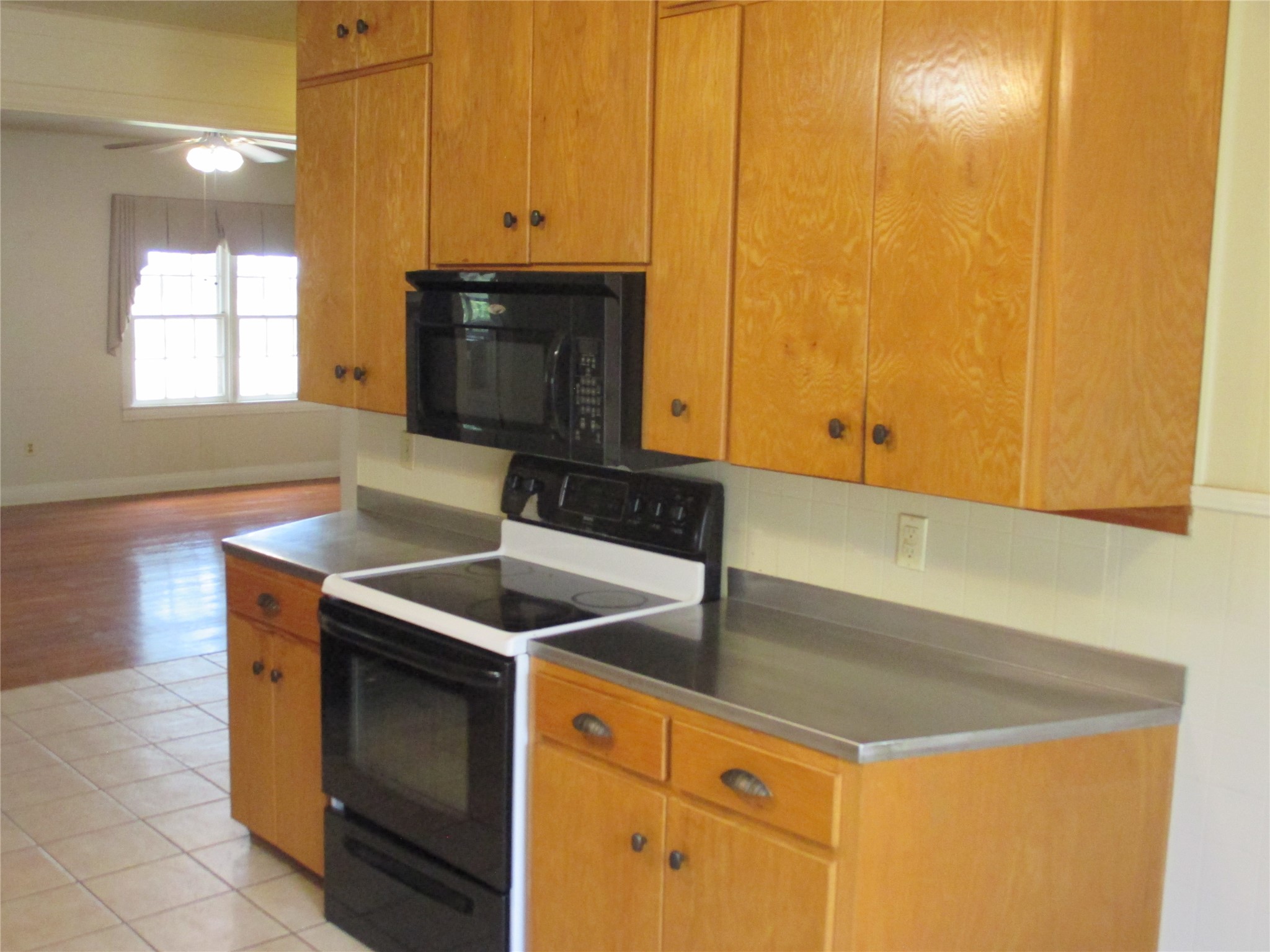 12610 Pecan School Road Bartlett, TX 76511 - Photo 7 of 21 A well-appointed kitchen offers ample cabinetry, modern appliances, and a practical layout.
