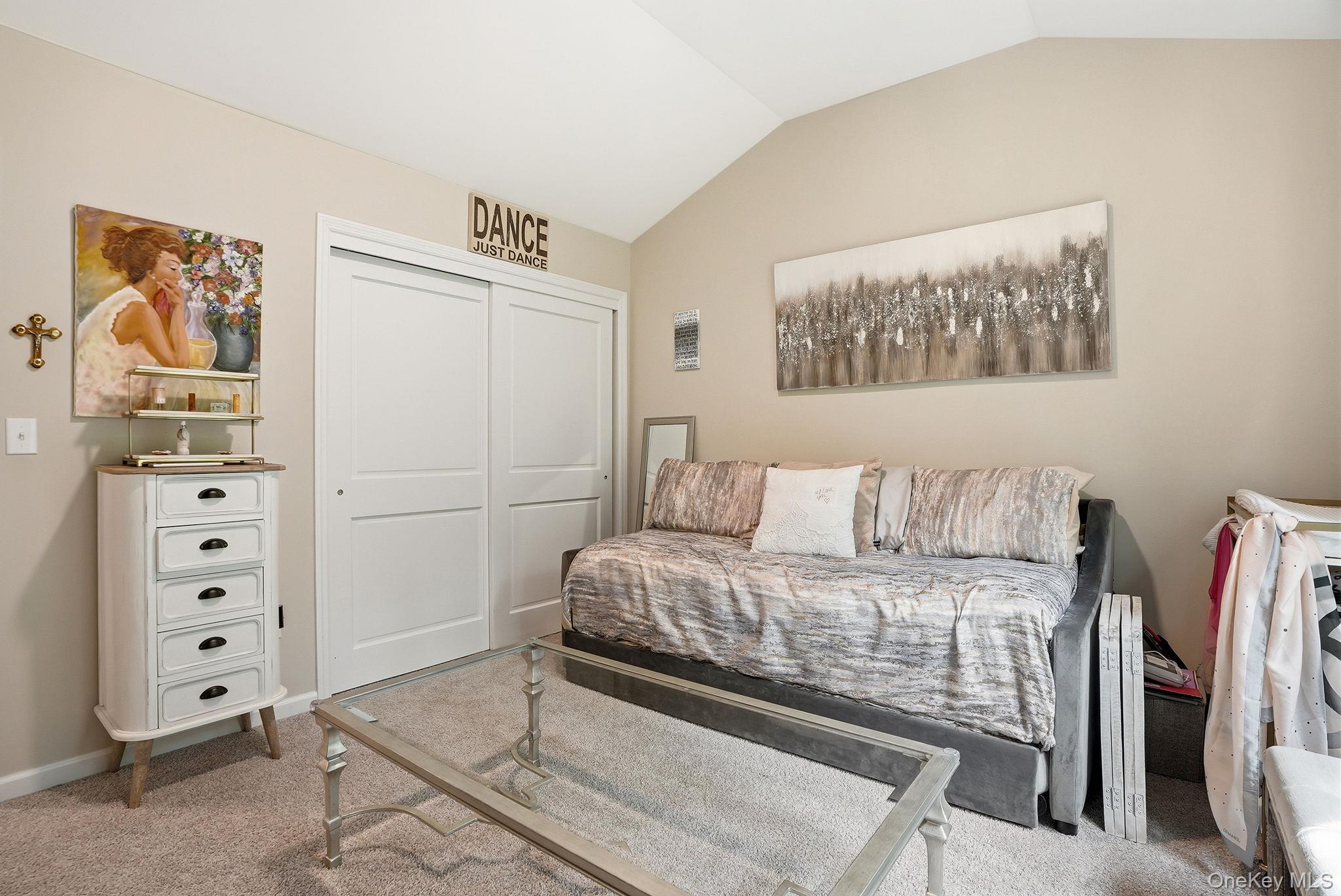 8 Muscoot River Road Granite Springs, NY 10527 - Photo 26 of 40 Second bedroom featuring a vaulted ceiling and neutral wall tones