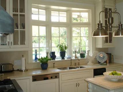 a kitchen with sink and window