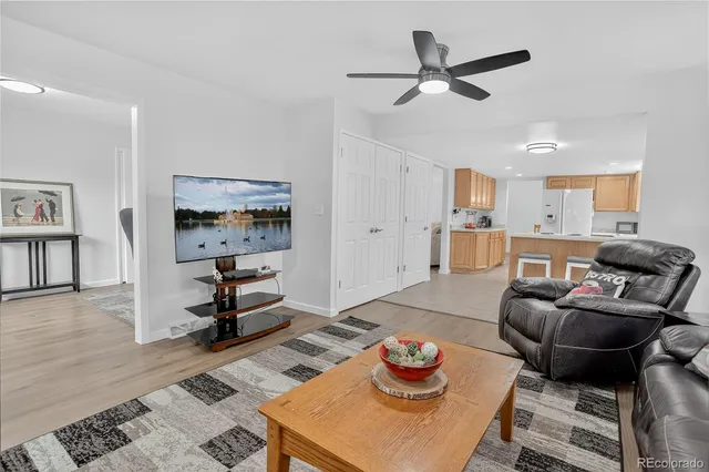 a bathroom with a toilet sink and vanity
