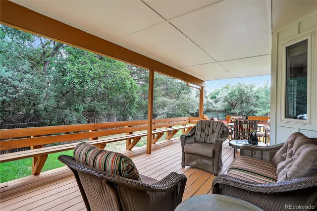 a outdoor living space with patio furniture and garden view