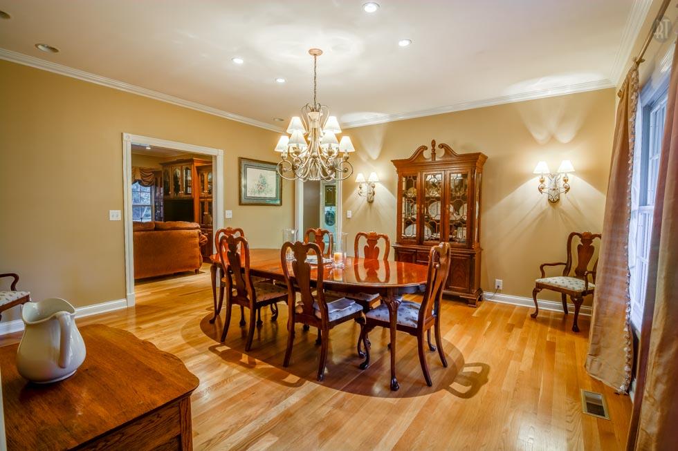 2352 Baker Road Goodlettsville, TN 37072 - Photo 4 of 29 The large formal dining room will delight with its large elegant chandelier, crown molding, and dual double-light sconces