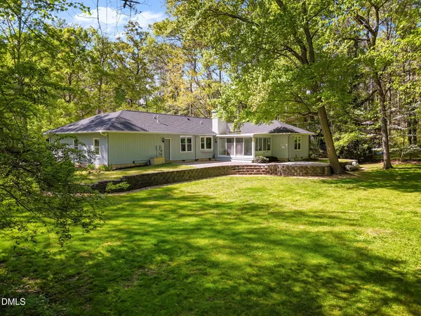 a view of a house with a big yard